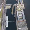 General oblique aerial view of the harbour area, centred on the Victoria Dock taken from the WSW.