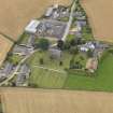 General oblique aerial view of Kirton of Tealing centred on the church taken from the SSE.