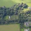 General oblique aerial view of the Dunninald estate, centred on Dunninald Castle, taken from the ENE.