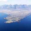 General oblique aerial view centred on Loch na h-Airde, the 'Viking Canal’ and Rubh' an Dunain with the Cuillin Hills in the background, taken from the SW.