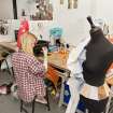 View of student working within the studio space of the textiles department in Newbery Tower