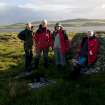 I Parker (RCAHMS) and volunteers visiting the St Ninian's Point east well.