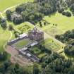 Oblique aerial view of Drumlanrig Castle and gardens, taken from the NW.