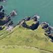 Oblique aerial view of Dunskey Castle, taken from the N.
