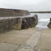 E wall and slipway. View from N