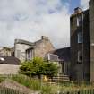 General view of Watergate, Rothesay, Bute, showing rear stair tower of tenements on Guilford Square