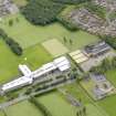 Oblique aerial view of Bo'ness Academy, Gauze Road, Grahamsdyke Road, Bo'ness, taken from the NW.