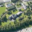 Oblique aerial view of Crichton Royal Hospital, centred on Rutherford House, taken from the ENE.
