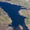 Oblique aerial view of the remains of a series of fish traps around the head of Loch Dunvegan near Kilmuir, Isle of Skye, taken from the SSW.