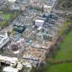 Oblique aerial view centred on the Quartermile re-development of the former Royal Infirmary, taken from the W.