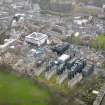 Oblique aerial view centred on the Quartermile re-development of the former Royal Infirmary, taken from the SE.