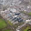 Oblique aerial view centred on the Quartermile re-development of the former Royal Infirmary, taken from the ESE.