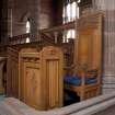 Minister's chair with south transept memorial chapel behind. 
