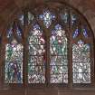Window in north aisle depicting Life of St Luke by William Wilson 1964