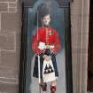 Painted panel of sentry box and Black Watch soldier at main entrance.