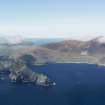 General oblique aerial view of St Kilda, centred on Village Bay and the island of Dun, taken from the SSE.