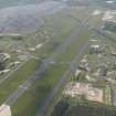Oblique aerial view of Leuchars Airfield, taken from the NE.