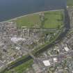 General oblique aerial view of Musselburgh centred on New Bridge, taken from the S.