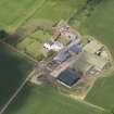 Oblique aerial view of Ugston Farm, taken from the SE.
