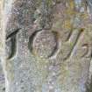 Detail of inscription on SE face.