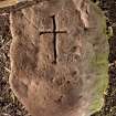View of incised cross slab (flash), including scale