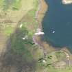 Oblique aerial view of the pier and buildings at Garadheancal, Tanera Mor, looking NW.