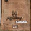 Detail of carved initials 'MR' and street name 'Mill Street'at 14-26 Russell Street and 19-23 Mill Street, Rothesay, Bute