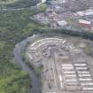 Oblique aerial view of the Glasgow Commonwealth Games Site during construction works, taken from the NW.