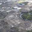 Oblique aerial view of the Glasgow Commonwealth Games Site during construction works, taken from the S.