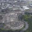Oblique aerial view of the Glasgow Commonwealth Games Site during construction works, taken from the SSE.