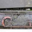 Mechanical signal operating wires, track side. These exit the signal box at ground level.