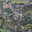 General oblique aerial view of Inveresk Village Road centred on the Manor House, looking to the SSE.