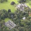 General oblique aerial view of Carberry Tower with adjacent stable block, looking to the SW.