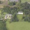 General oblique aerial view of Keith Marischal Country House with adjacent stables, looking to the NW.
