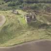 General oblique aerial view of Crichton Castle with The Slaughter House adjacent, looking to the WSW.