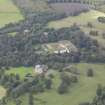 General oblique aerial view of Oxenfoord Castle with adjacent walled garden, looking to the NW.