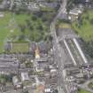 General oblique aerial view of St John's and King's Church with Dalkeith railway Station adjacent, looking to the SW.