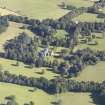 Oblique aerial view of Glenkindie House, taken from the SW.