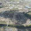 Oblique aerial view of the construction of the Glasgow Commonwealth games site, looking to the NW.