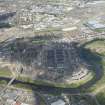 Oblique aerial view of the construction of the Glasgow Commonwealth games site, looking to the N.