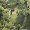 Oblique aerial view of Deer Abbey, looking to the E.