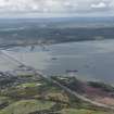 General oblique aerial view of the River Forth centred on the construction of the new  Forth Bridge crossing, looking to the SSW.