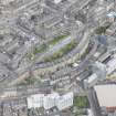 Oblique aerial view of the Edinburgh Tram Works on Shandwick Place, looking to the N.
