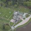 Oblique aerial view of Dunecht House and chapel, looking to the SW.