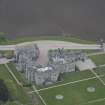 Oblique aerial view of Dunecht House and chapel, looking to the NNE.