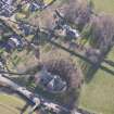 Oblique aerial view of Stow centred on Old Stow Kirk, looking NE.