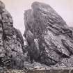 Wide view of rock formations, including figure, on the beach of Kilchattan, Colonsay.
Titled: '138. Behind Kilchattan, Colonsay.'
PHOTOGRAPH ALBUM NO 186: J B MACKENZIE ALBUMS vol.1