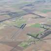 Oblique aerial view of East Fortune Airfield, looking SW.