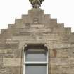 Detail of finial to gable above entrance to Sugarhouse Close at 160 Canongate, Edinburgh.