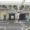 Entrance and exit tunnels to taxi rank and drop off area, view from west